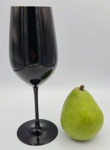 The black tasting glass with company symbol